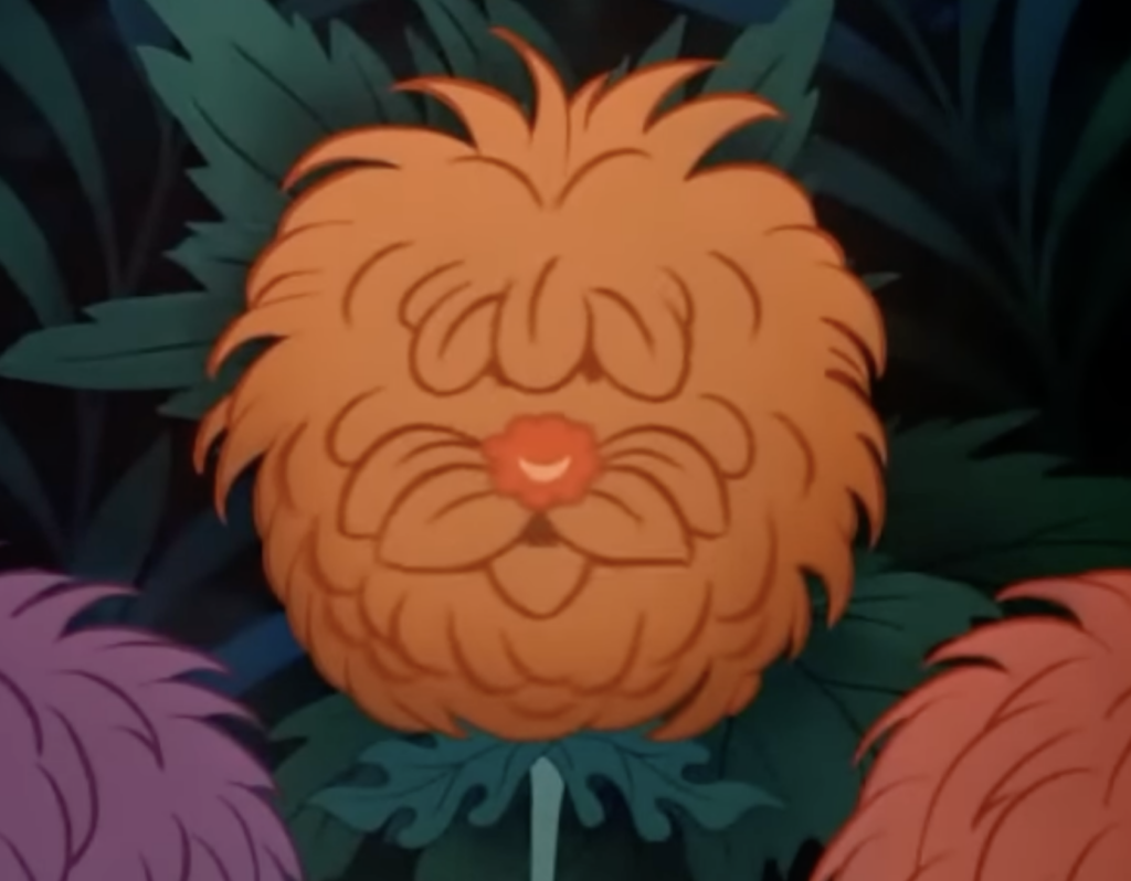 a shaggy flower -- a ball of orange in the center of the screen with a few petals looking sticking out like hair