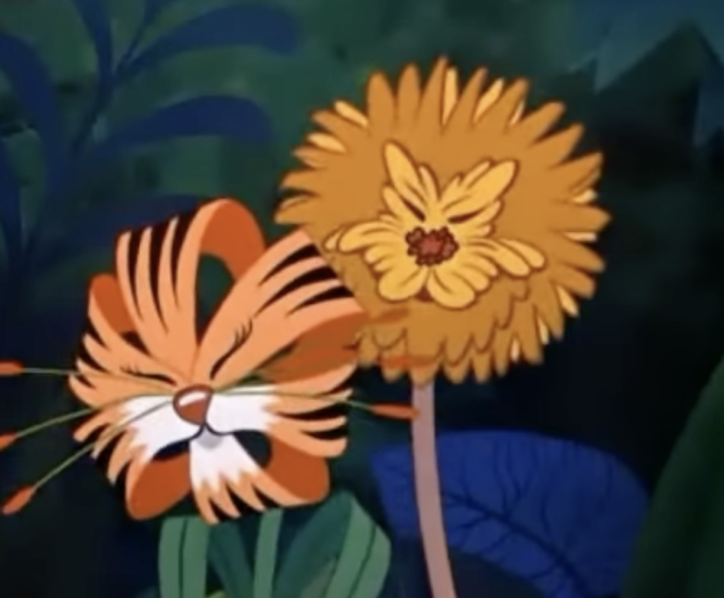 2 orange flowers, one with the face of a lion, the other a tiger